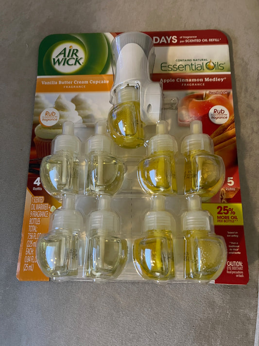 Air Wick scented oil plug in with 9 additional refills NEW