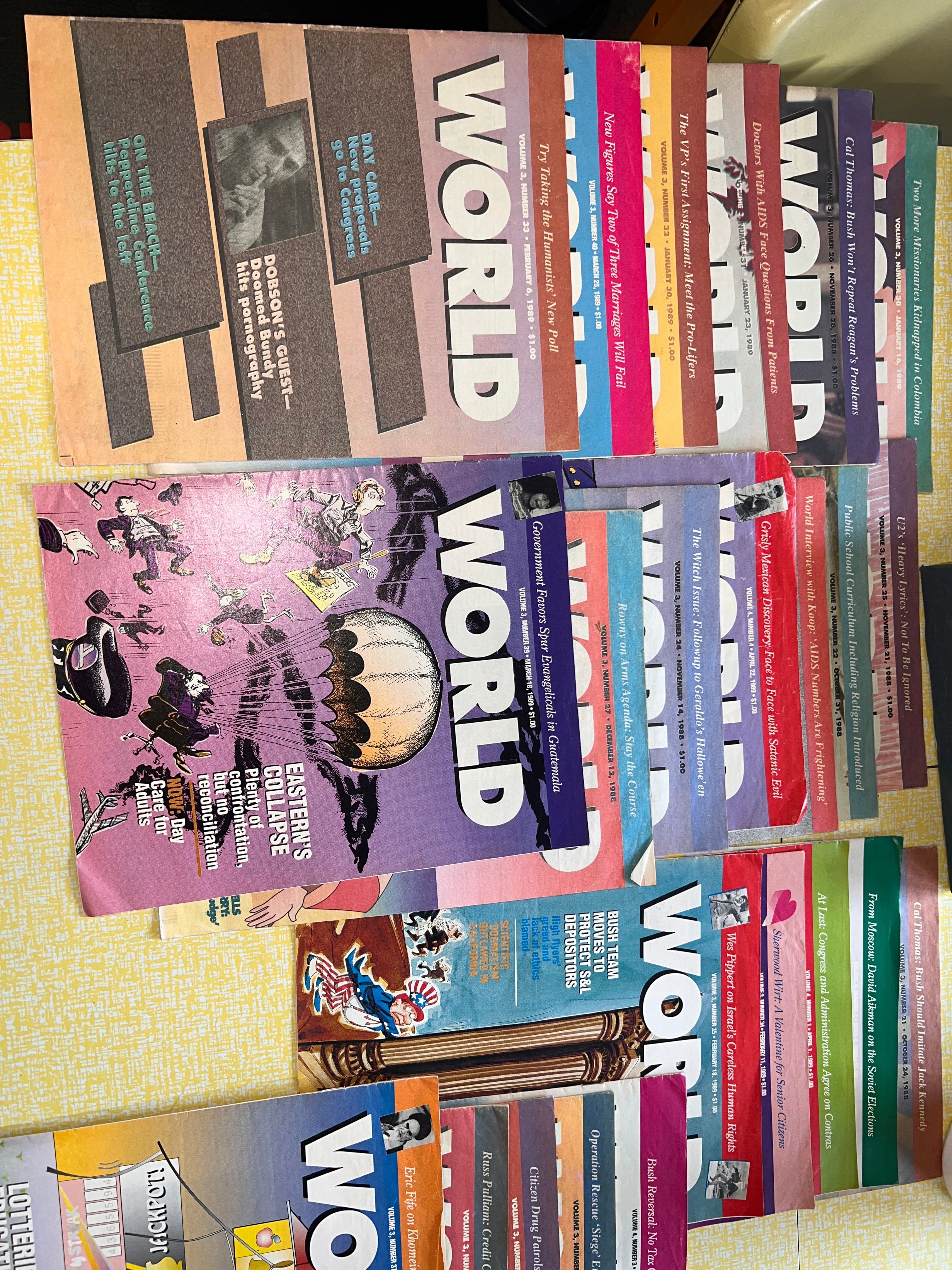 Bundle of 21 WORLD Christian News magazines from 1988-1989