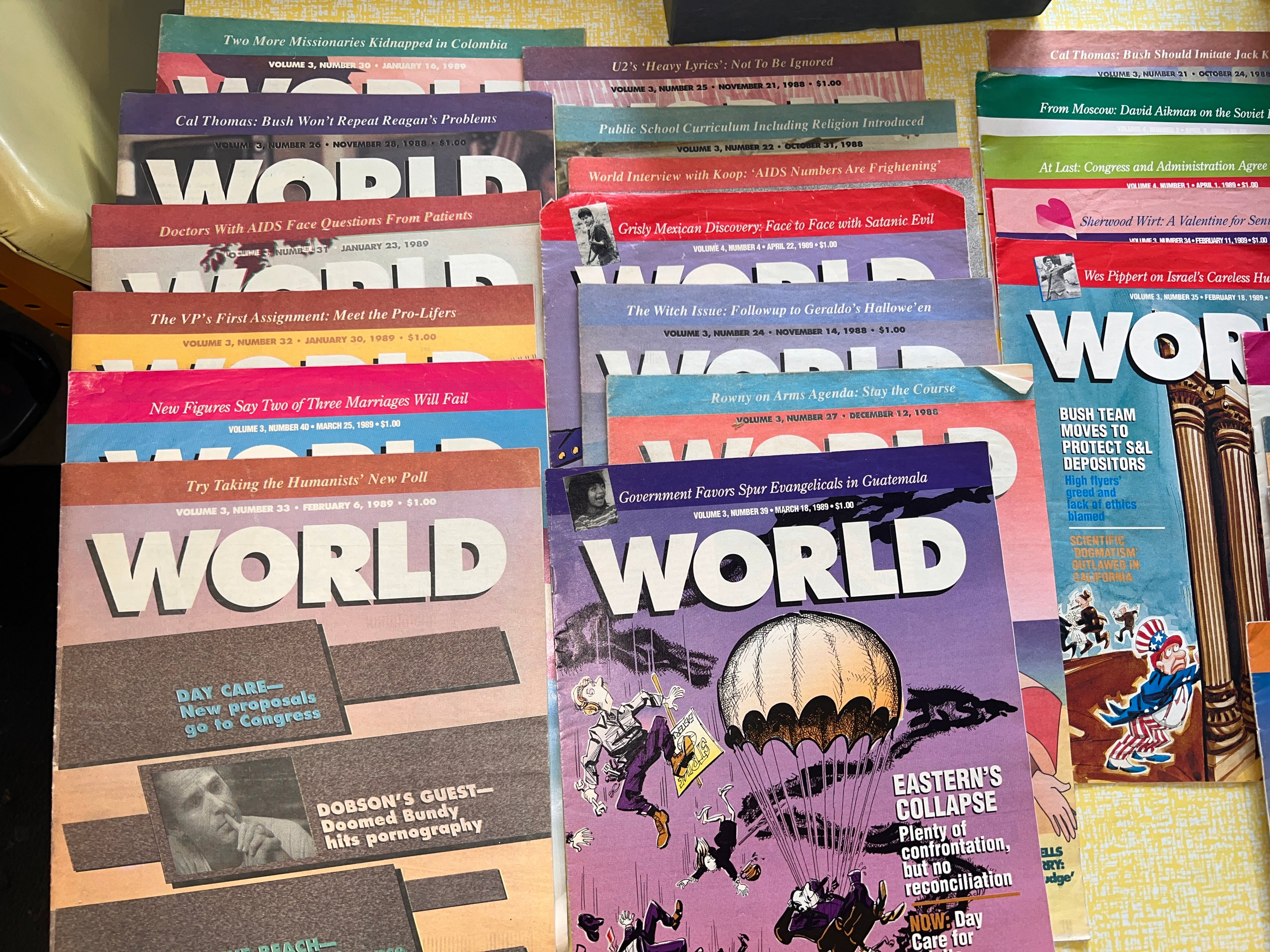 Bundle of 21 WORLD Christian News magazines from 1988-1989