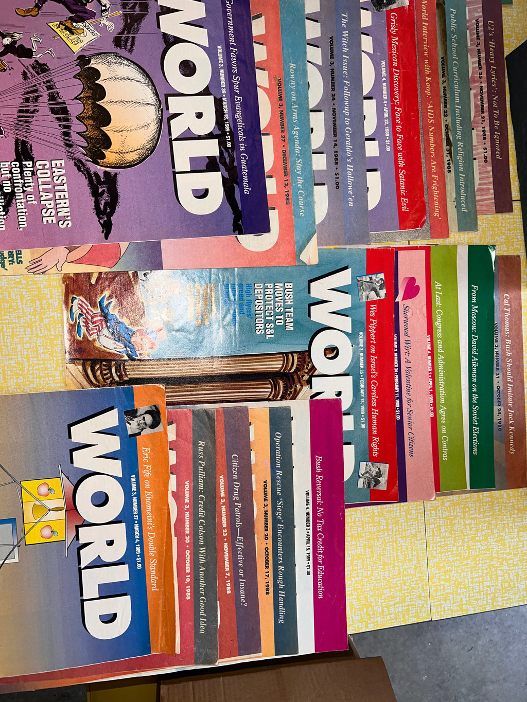 Bundle of 21 WORLD Christian News magazines from 1988-1989