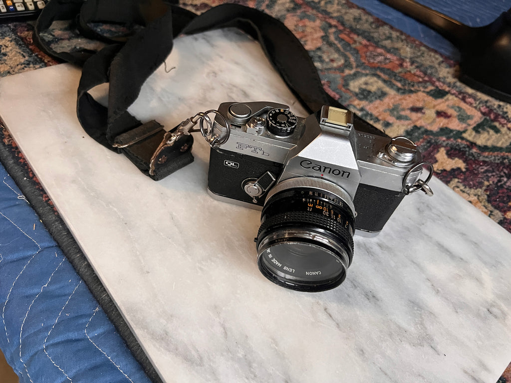 Canon FTb QL 35mm Film SLR Camera w/ 50mm Lens and Nikon 140 Litetouch Zoom