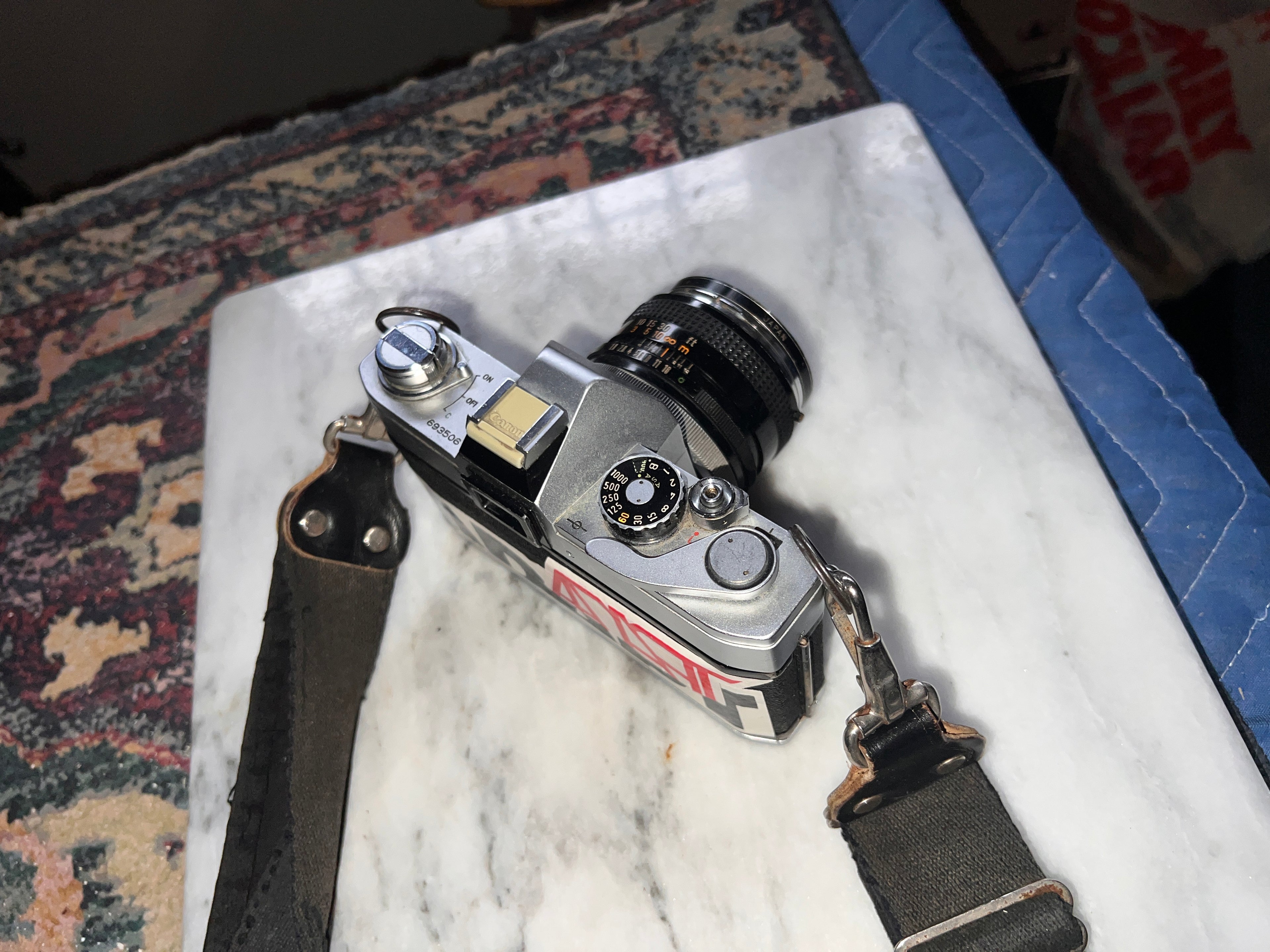 Canon FTb QL 35mm Film SLR Camera w/ 50mm Lens and Nikon 140 Litetouch Zoom