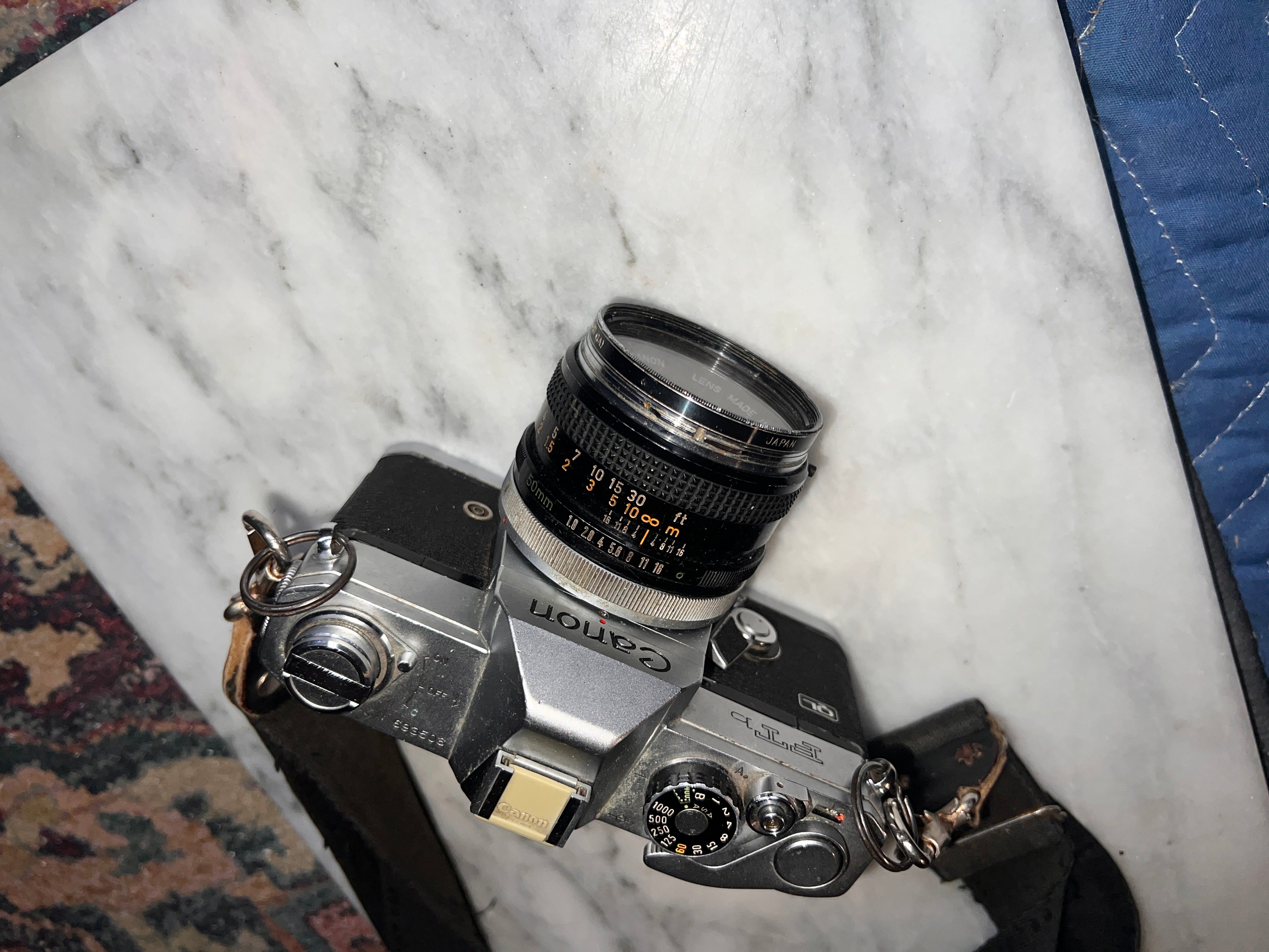 Canon FTb QL 35mm Film SLR Camera w/ 50mm Lens and Nikon 140 Litetouch Zoom