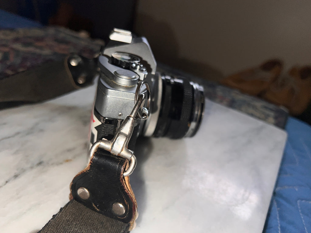 Canon FTb QL 35mm Film SLR Camera w/ 50mm Lens and Nikon 140 Litetouch Zoom