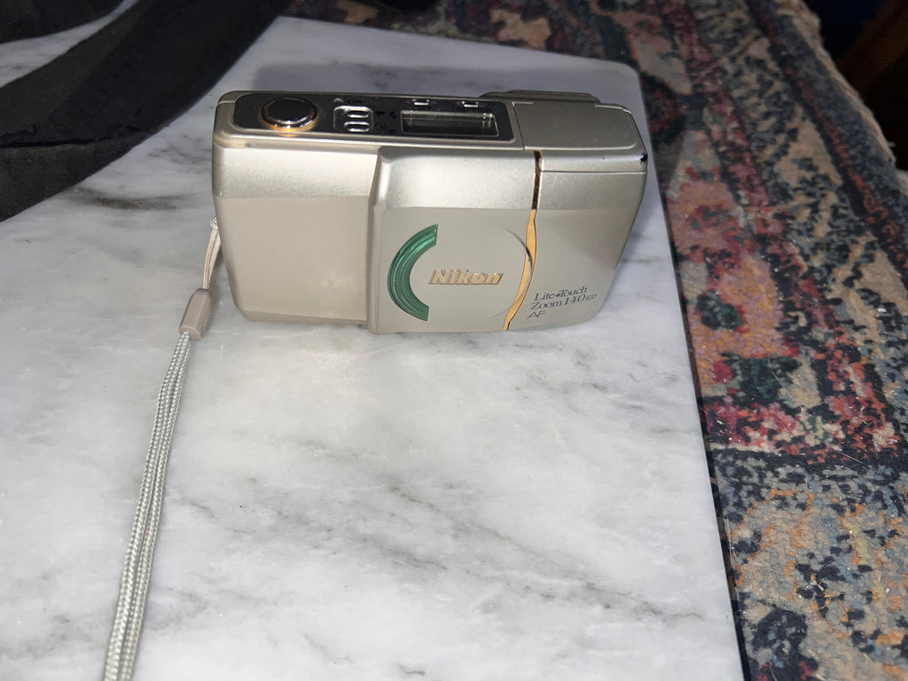 Canon FTb QL 35mm Film SLR Camera w/ 50mm Lens and Nikon 140 Litetouch Zoom